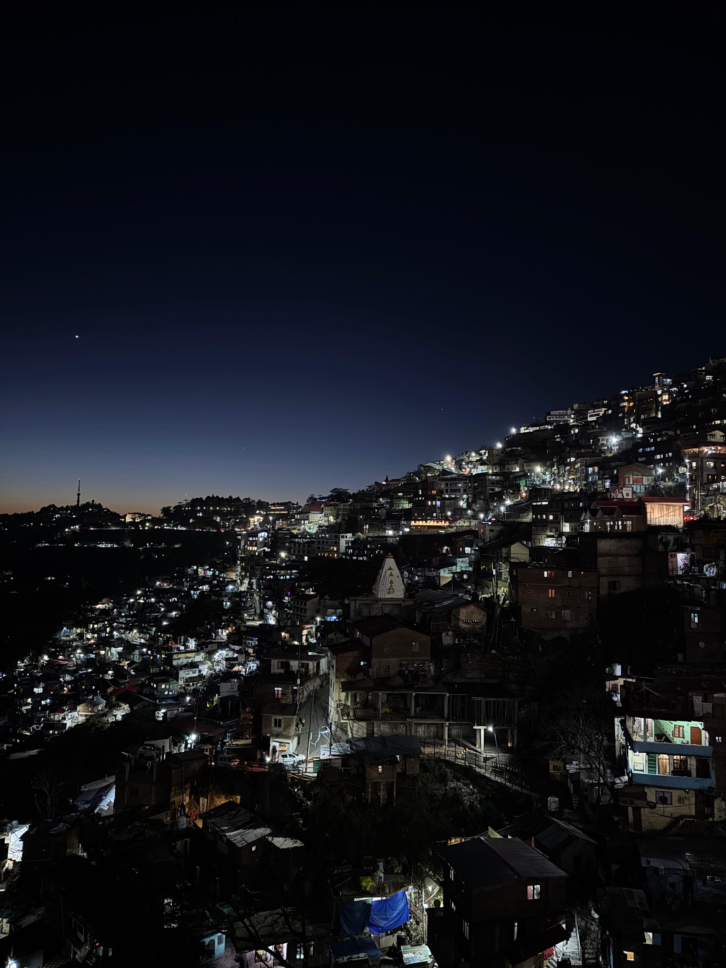 Shimla town with snow mountains